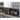 Caitbrook Storage Bed - Gray / California King
