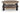 Ridgester Round Coffee Table - Light Brown/Black