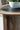 Dontayne Round End Table - Warm Brown